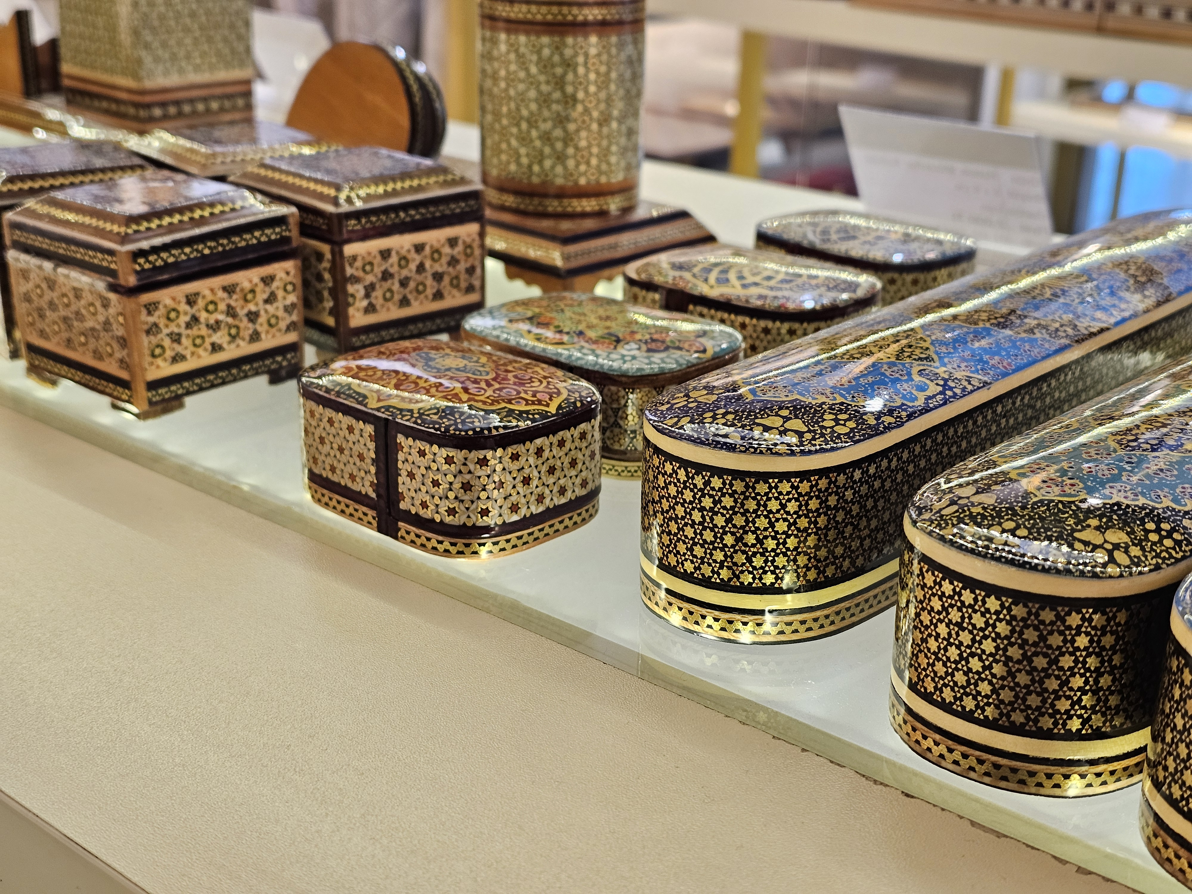 Artisan working on traditional Iranian handicraft