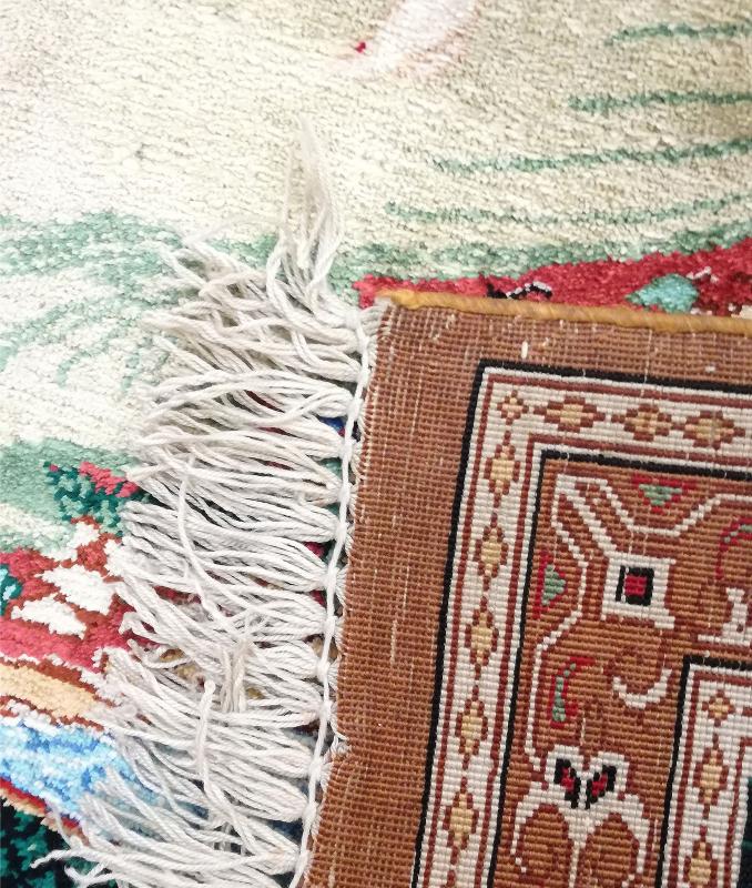 İran’ın%20El%20Dokuma%20Saf%20İpek%20Halısı%20(56%20x%2070)%20cm